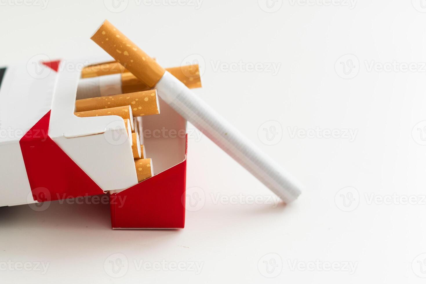 Heap of cigarettes. Isolated on a white background. photo