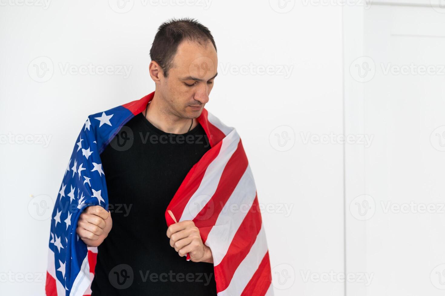 Man holding flag and posing for photoshoot photo