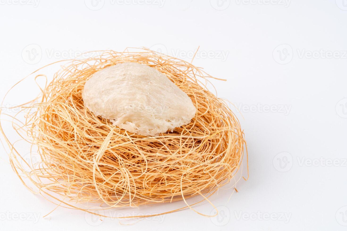 Raw edible birds nest materials for tradition chinese medicine. Swallow nest the traditional chinese delicacy. photo