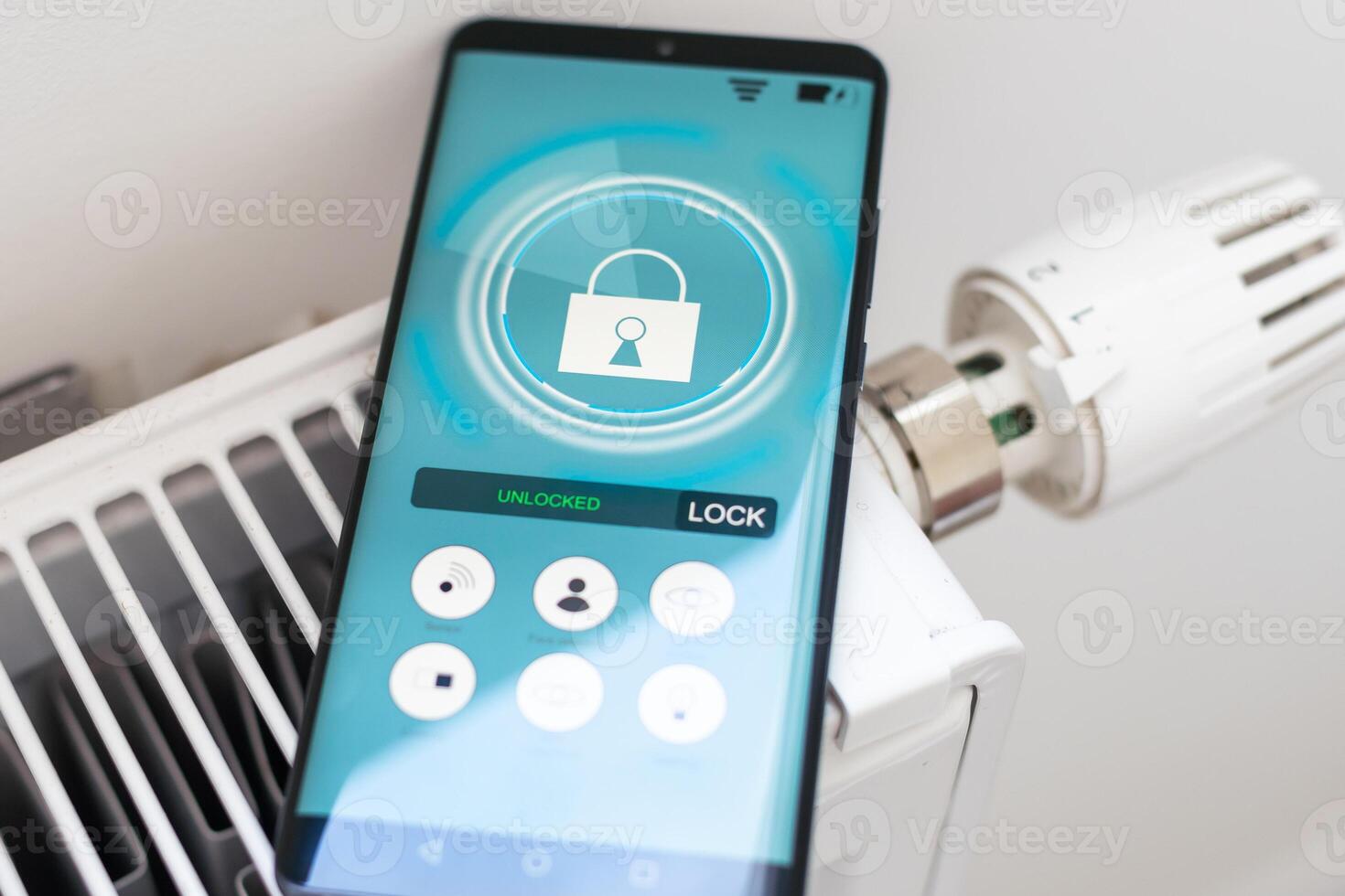 Smart Home. Man Controlling Heating Using App photo