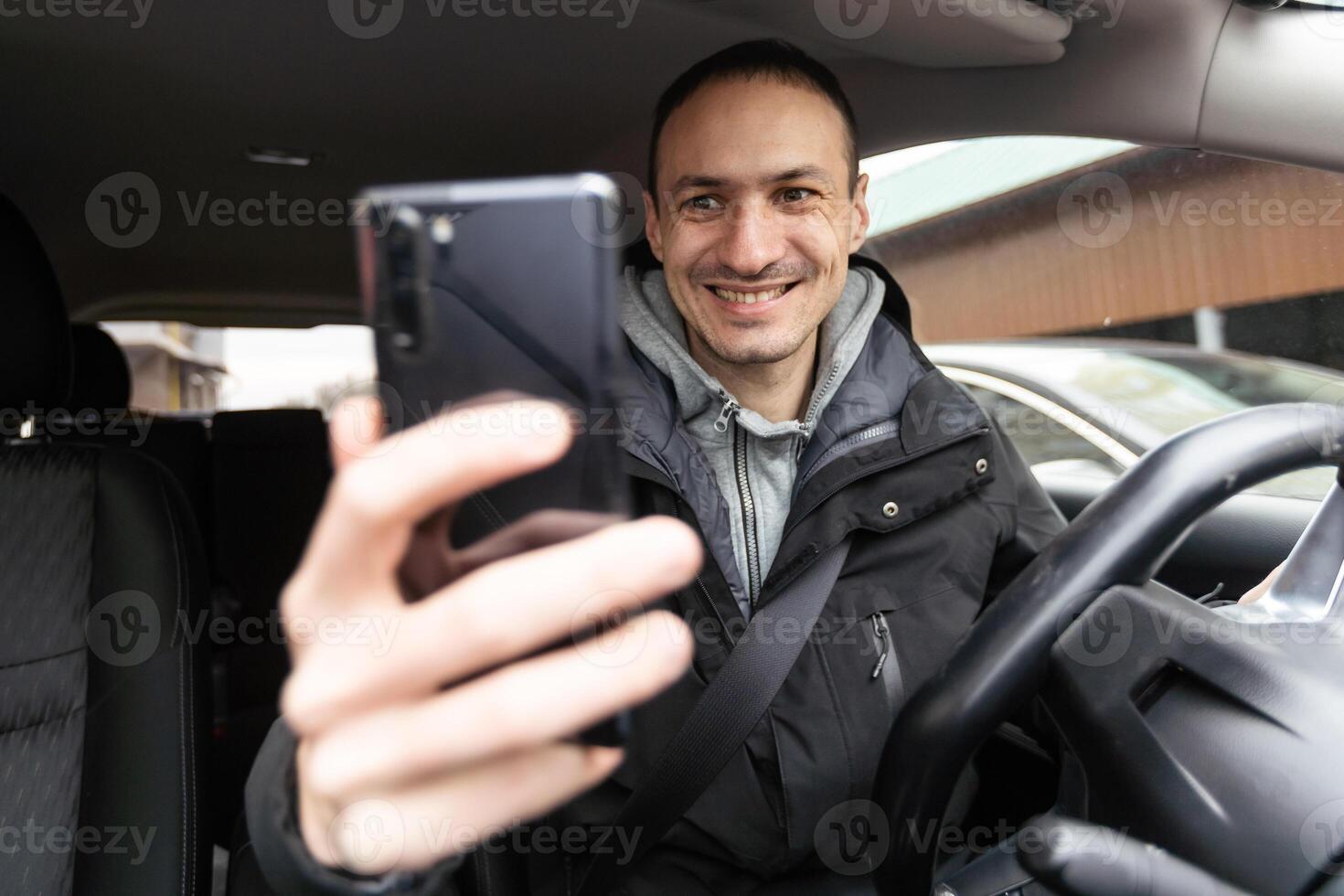 Man Using Gps Navigation System In Car to travel photo