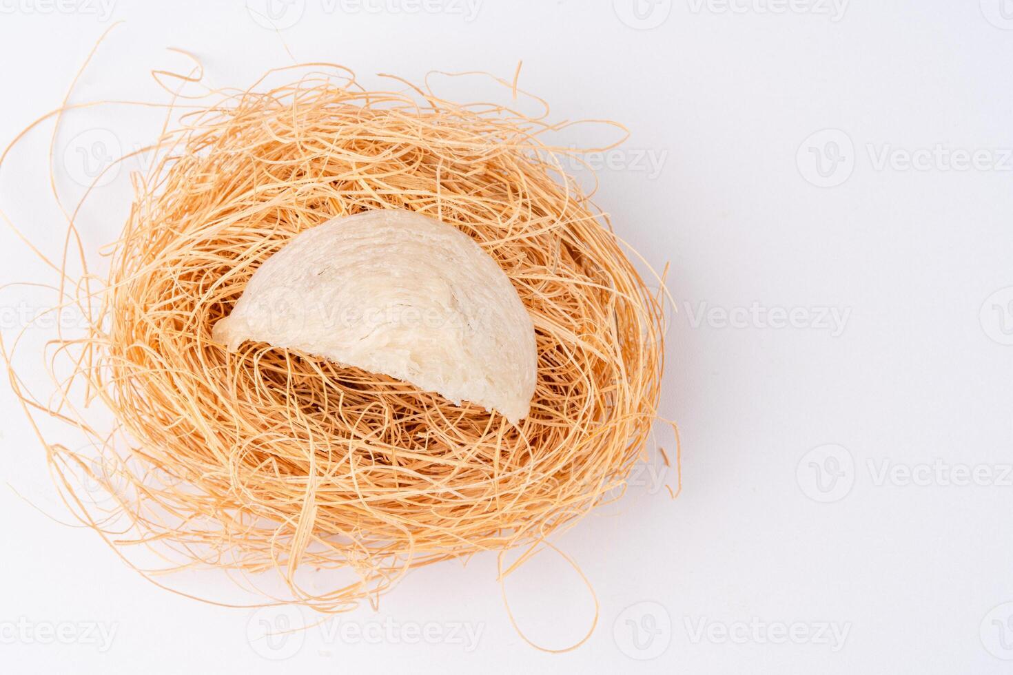 Raw edible birds nest materials for tradition chinese medicine. Swallow nest the traditional chinese delicacy. photo