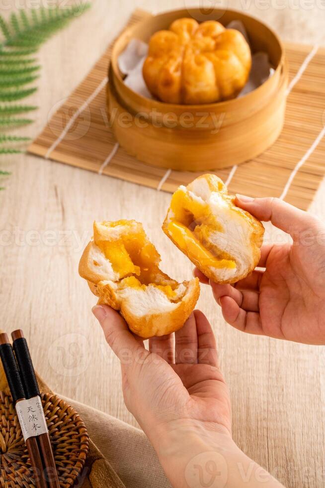 Baozi or Bakpao is a type of yeast-leavened filled bun in various Chinese cuisines. photo