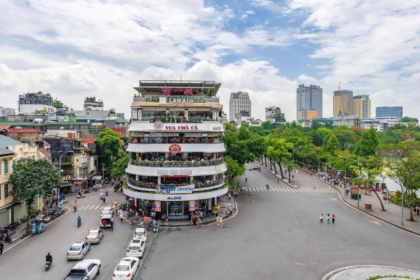 Hanoi, Vietnam - 26 June 2024 Beautiful morning at the building called Shark's Jaw, at Dong Kinh Nghia Thuc Square. Famous landmark, famous destination of Hanoi, Vietnam photo