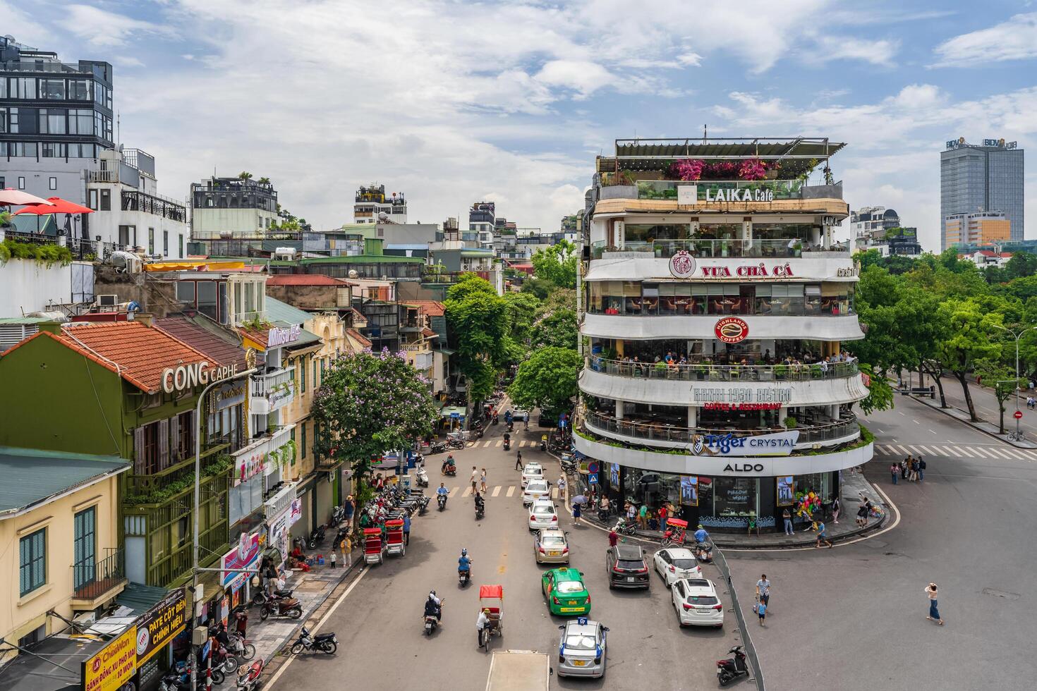 Hanoi, Vietnam - 26 June 2024 Beautiful morning at the building called Shark's Jaw, at Dong Kinh Nghia Thuc Square. Famous landmark, famous destination of Hanoi, Vietnam photo