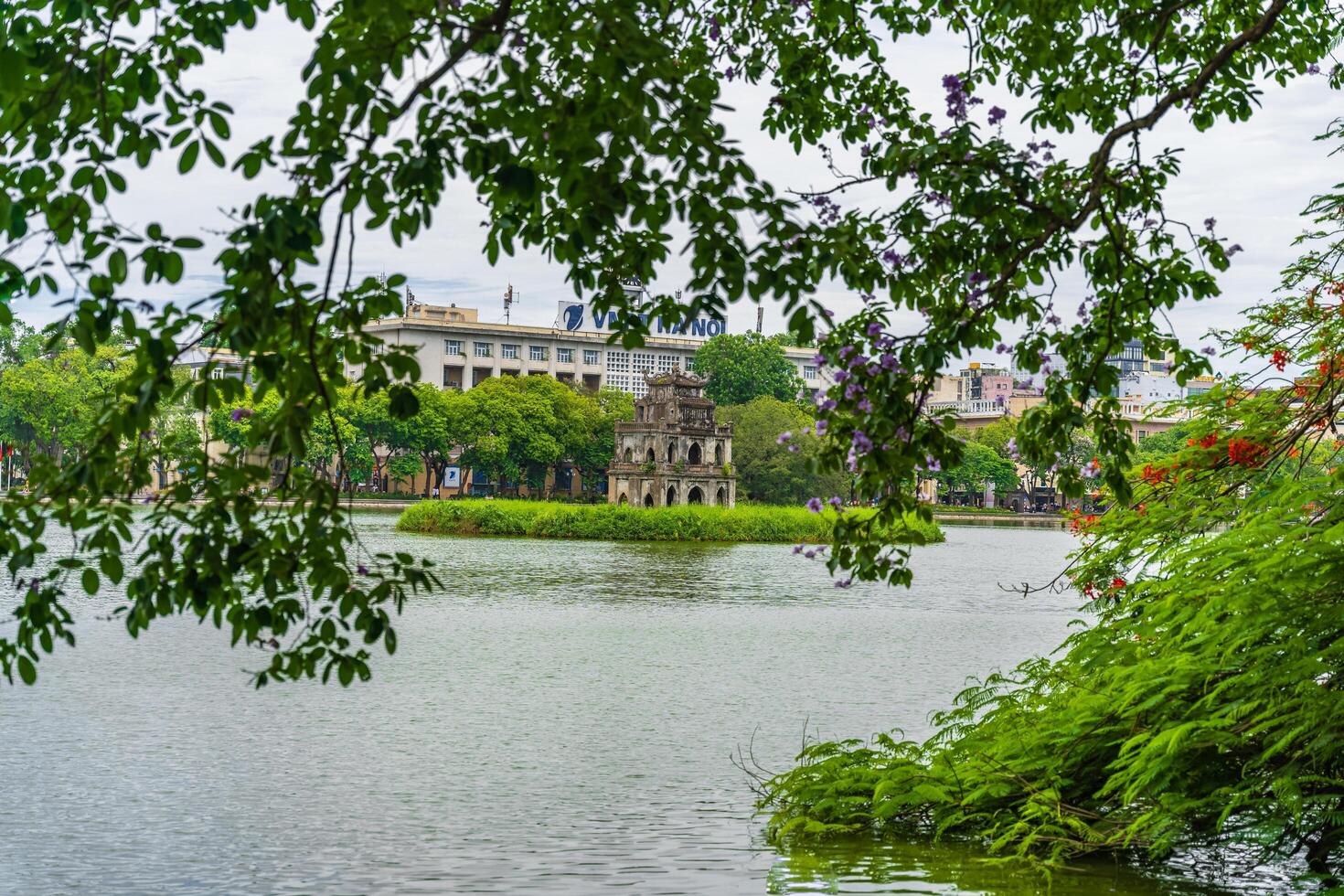 Hanoi, Vietnam - 26 June 2024 Turtle Tower Thap Rua in Hoan Kiem lake Sword lake, Ho Guom in Hanoi, Vietnam. photo