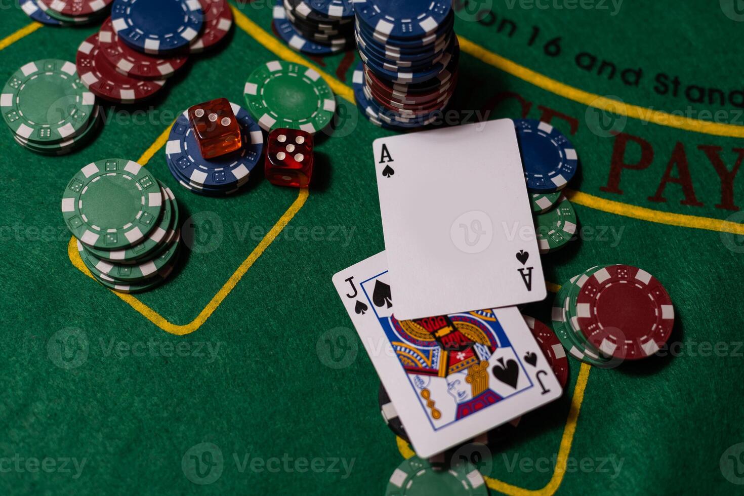 Blackjack playing cards and casino poker chips photo
