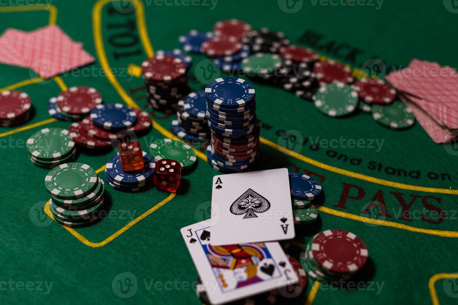 Black Jack casino table with cards and chips photo
