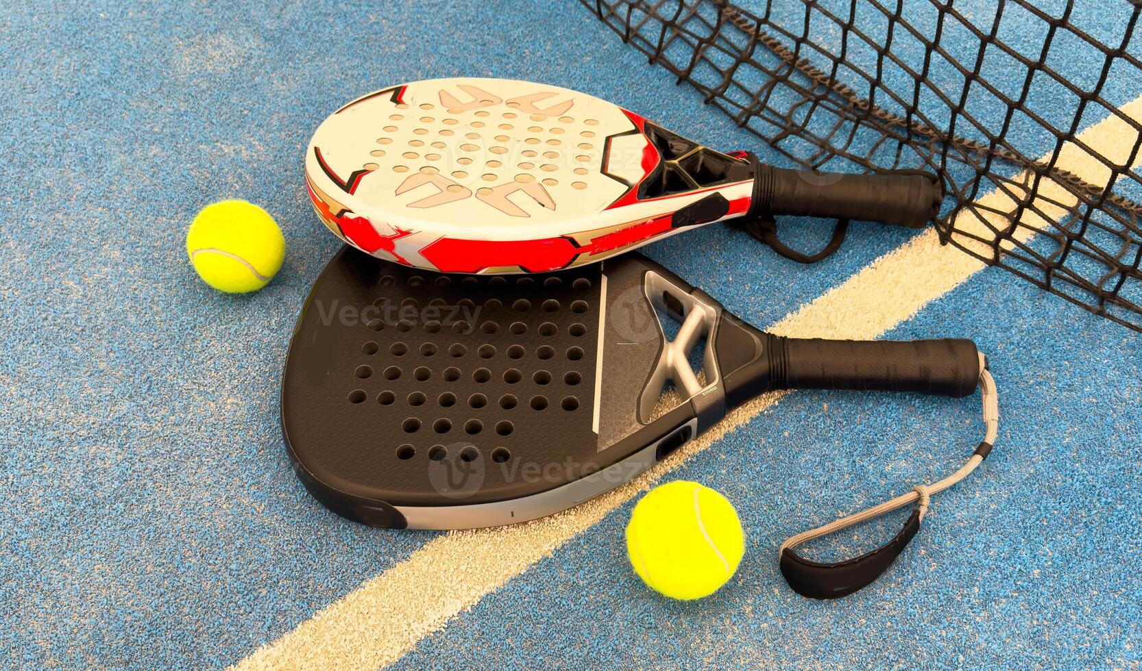 professional paddle tennis racket with natural lighting on court background. Horizontal sport theme poster, greeting cards, headers, website and app photo