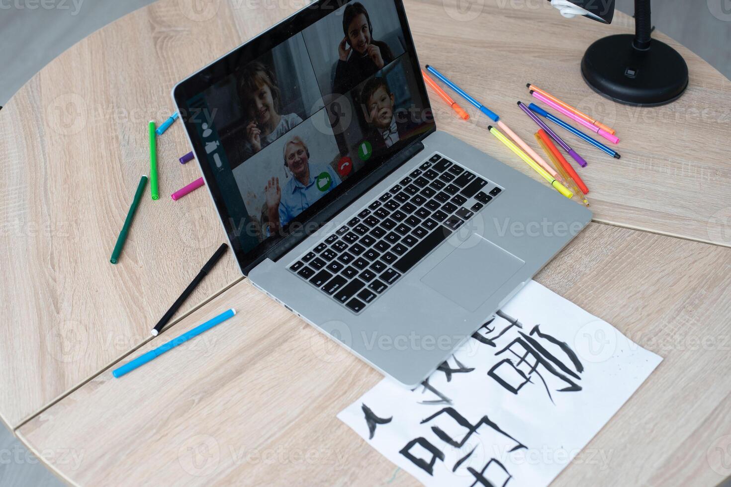 Online remote learning. School kids with computer having conference chat with teacher and class group. Child studying from home. Homeschooling during quarantine and coronavirus outbreak photo