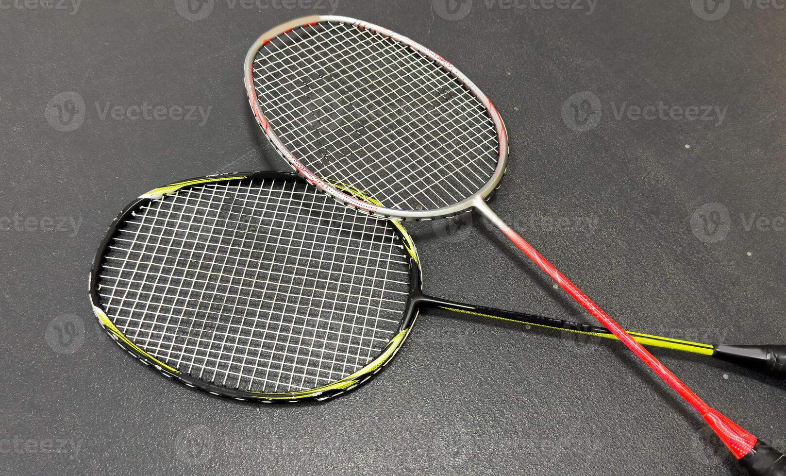 Competitive sports and high performance in tournament match conceptual idea with badminton rackets and shuttlecock with copy space photo