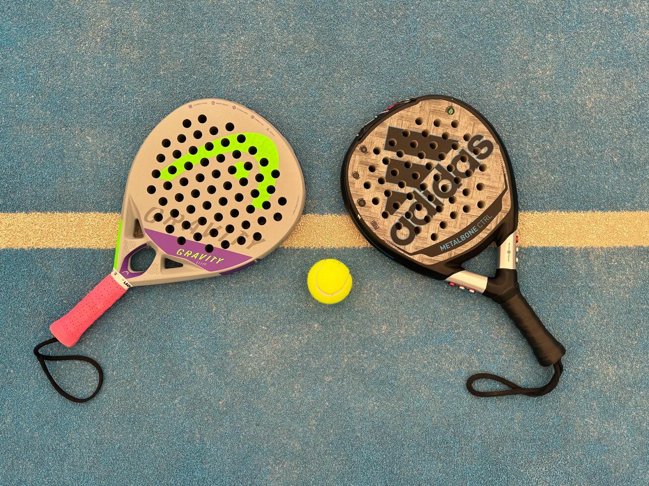 Kyiv, Ukraine, July 10, 2024 paddle tennis racket and balls, adidas, head photo