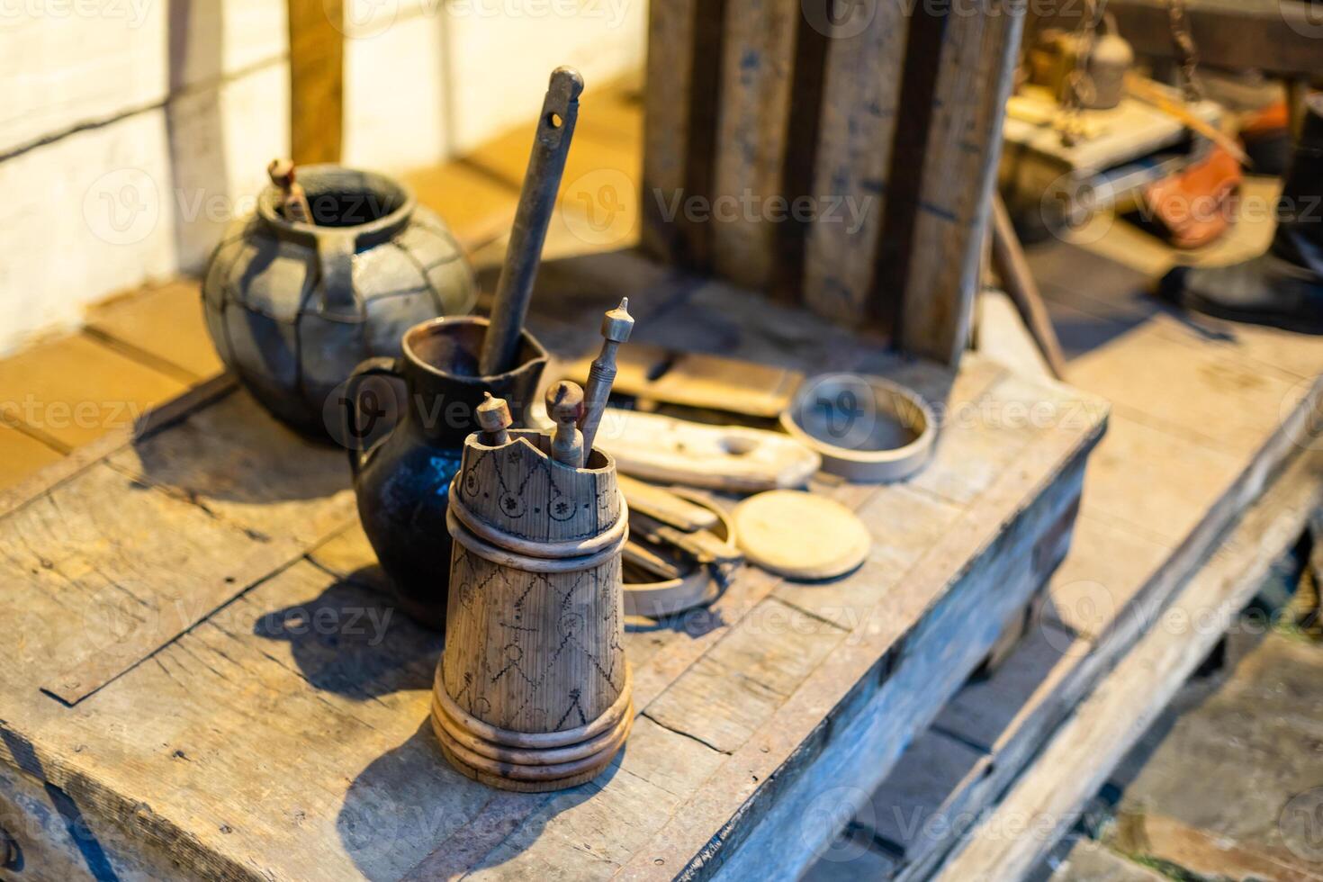 Some old utensils in an old and rural kitchen photo