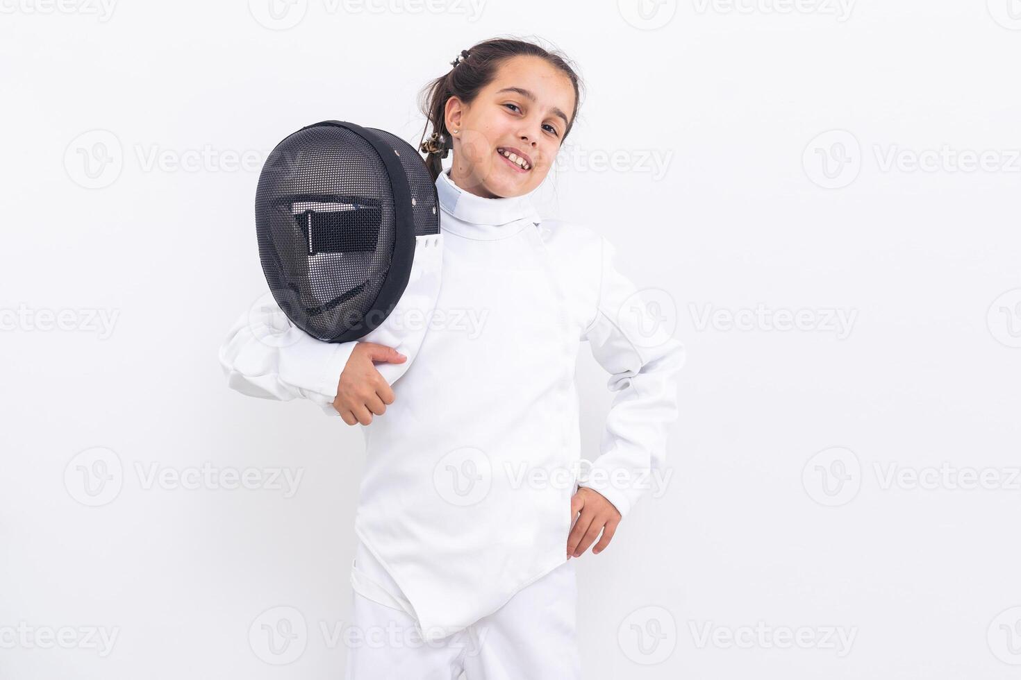 little girl in a fencing suit photo