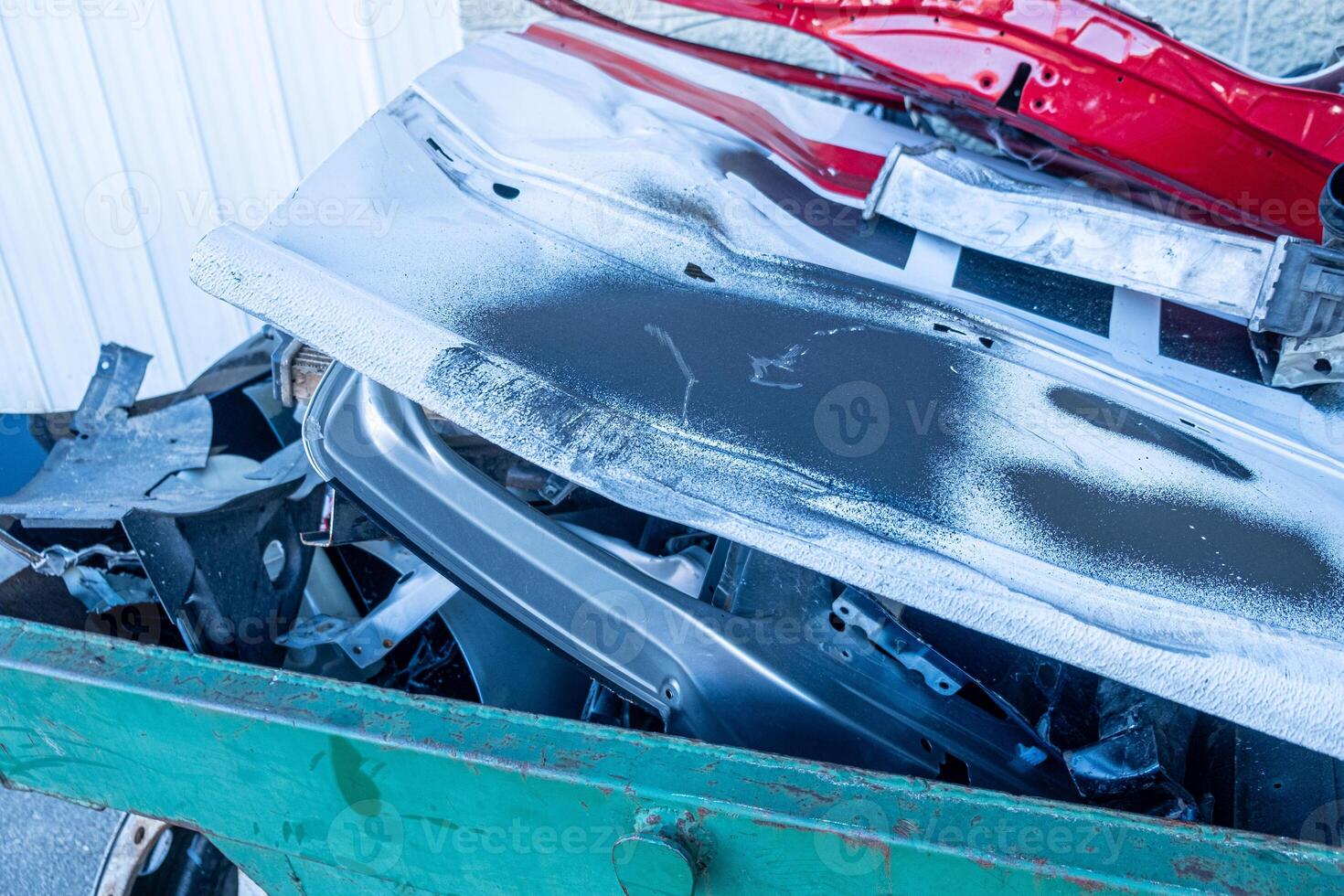 car parts accumulated as scrap in a junkyard photo