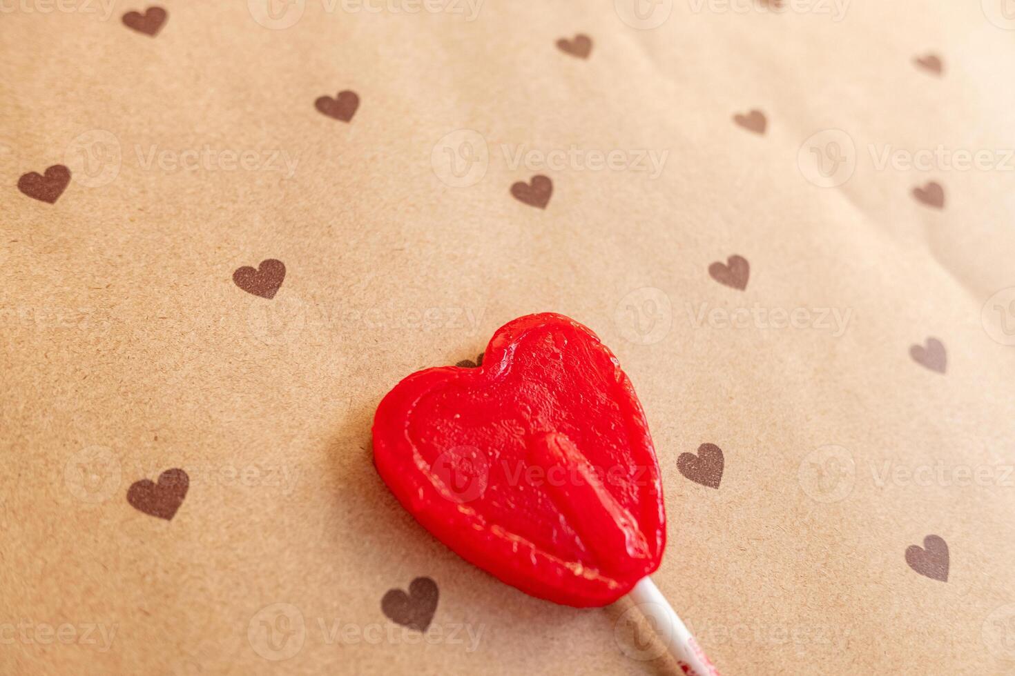 Lollipop heart shape isolated. Hearts background candy on stick love valentine's day gift. photo