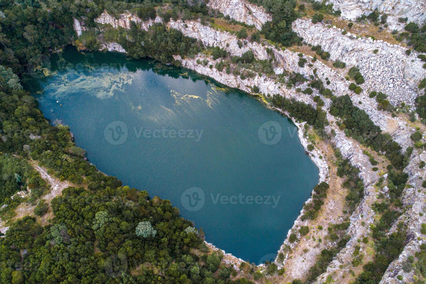 drone aerial view of an old abandoned quarry photo
