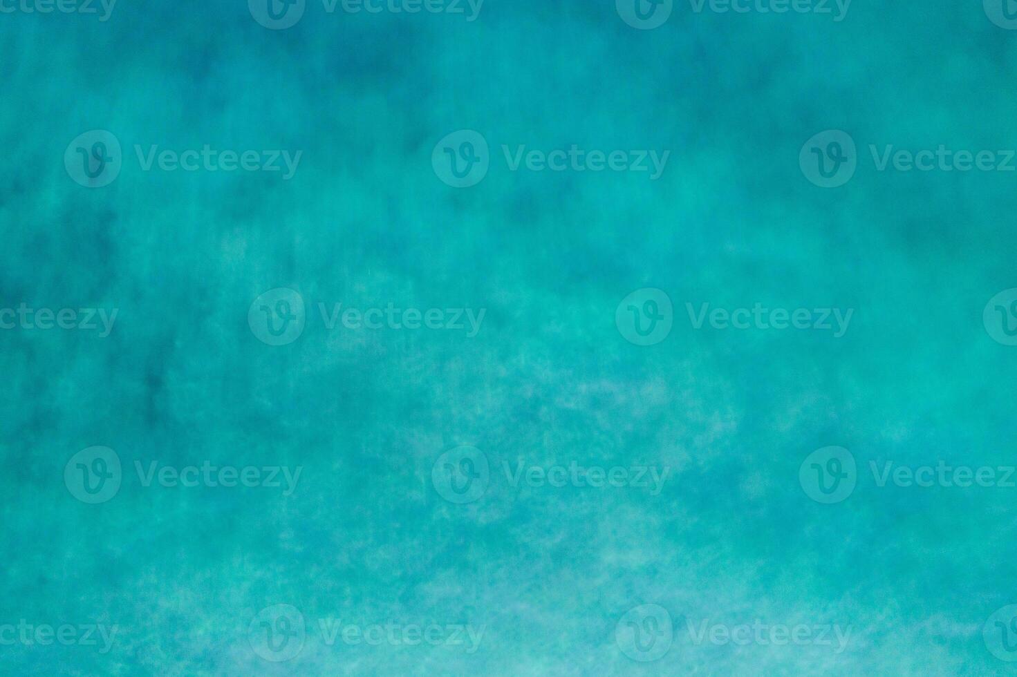 Aerial view of a clear sea water texture. View from above Natural turquoise background, green water reflection. photo