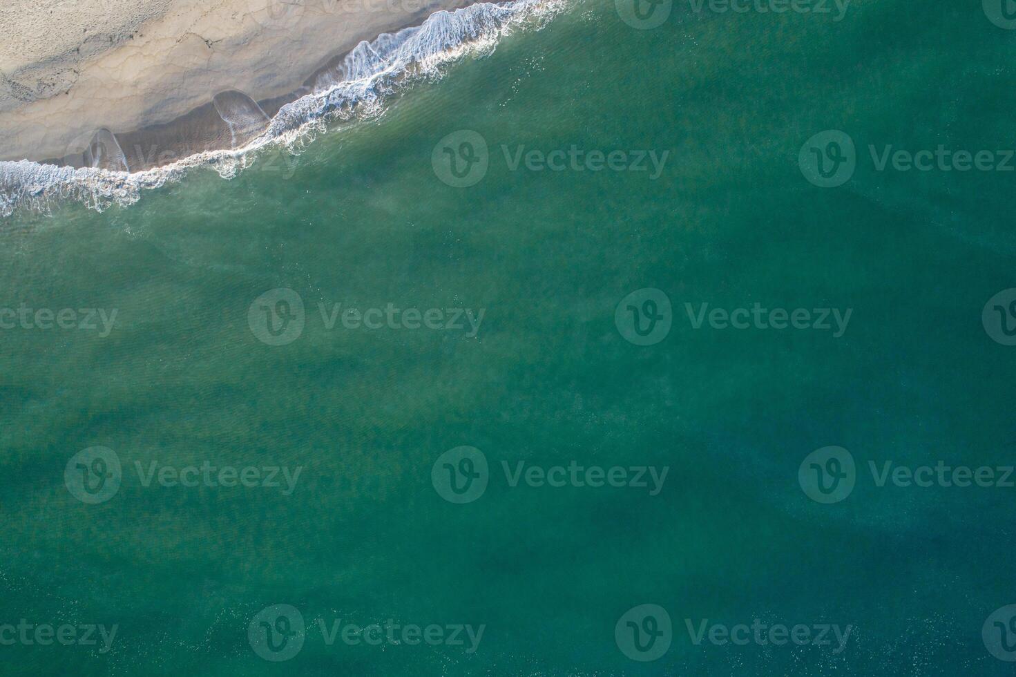 aerial view of turquoise water beach photo