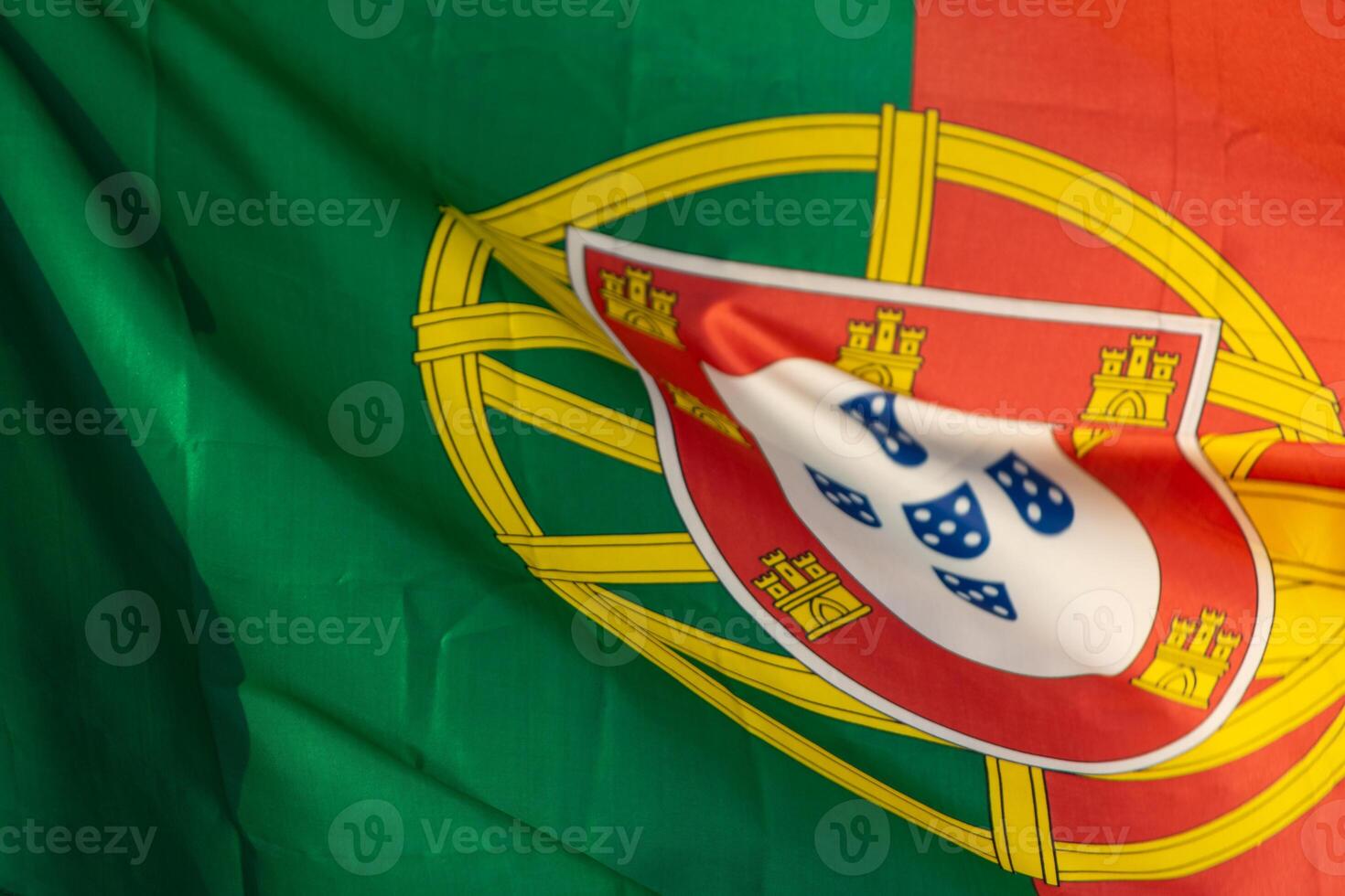 close up view of the flag of Portugal fluttering in the wind photo