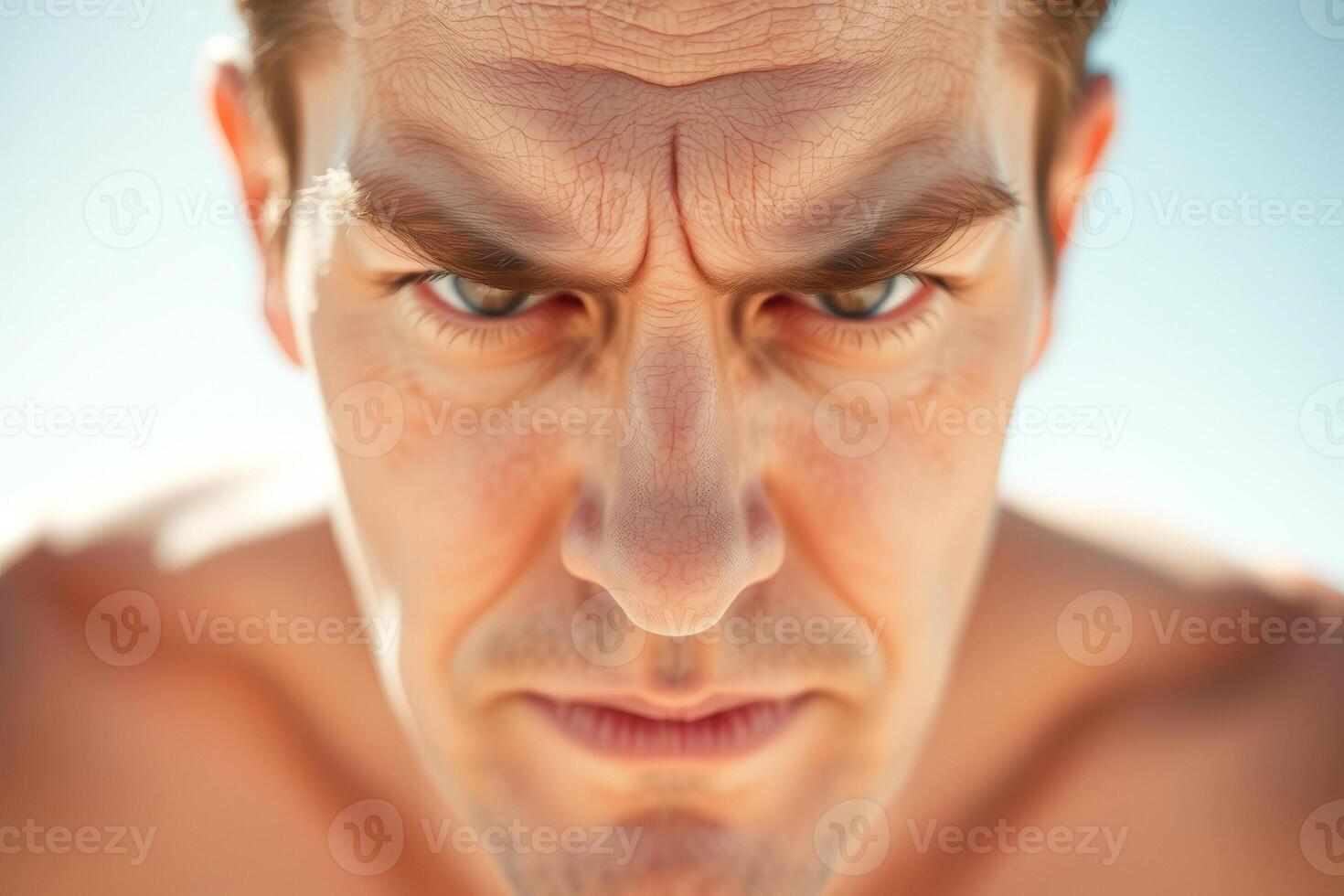 Close up portrait of a man looking intensely photo