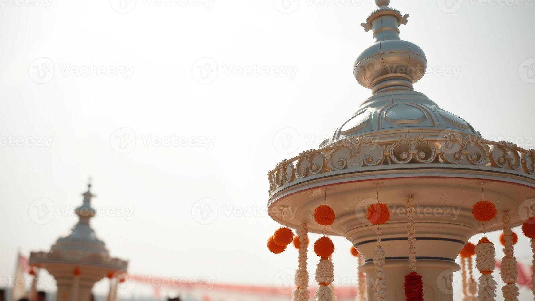 Ornate White Structure with Orange and White Decorations photo
