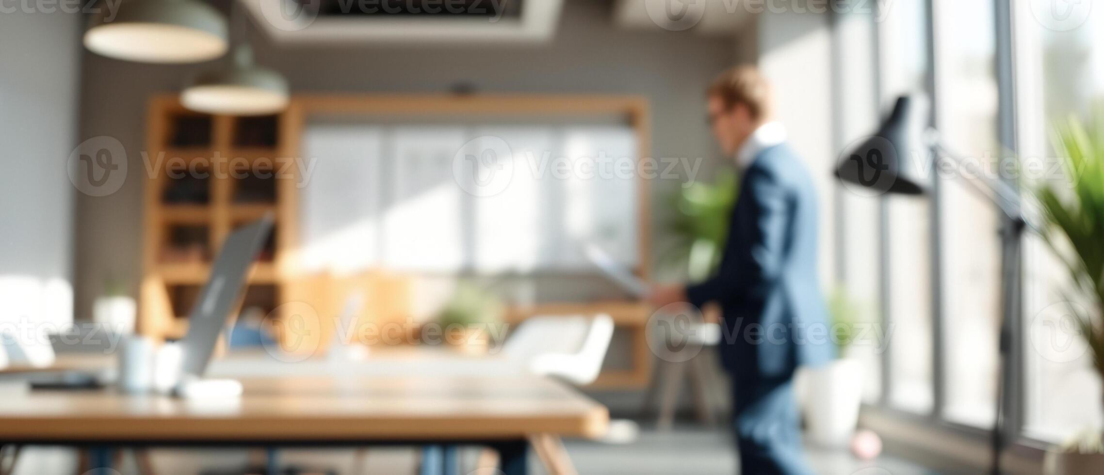 Blurred Office Background with Man and Desk photo