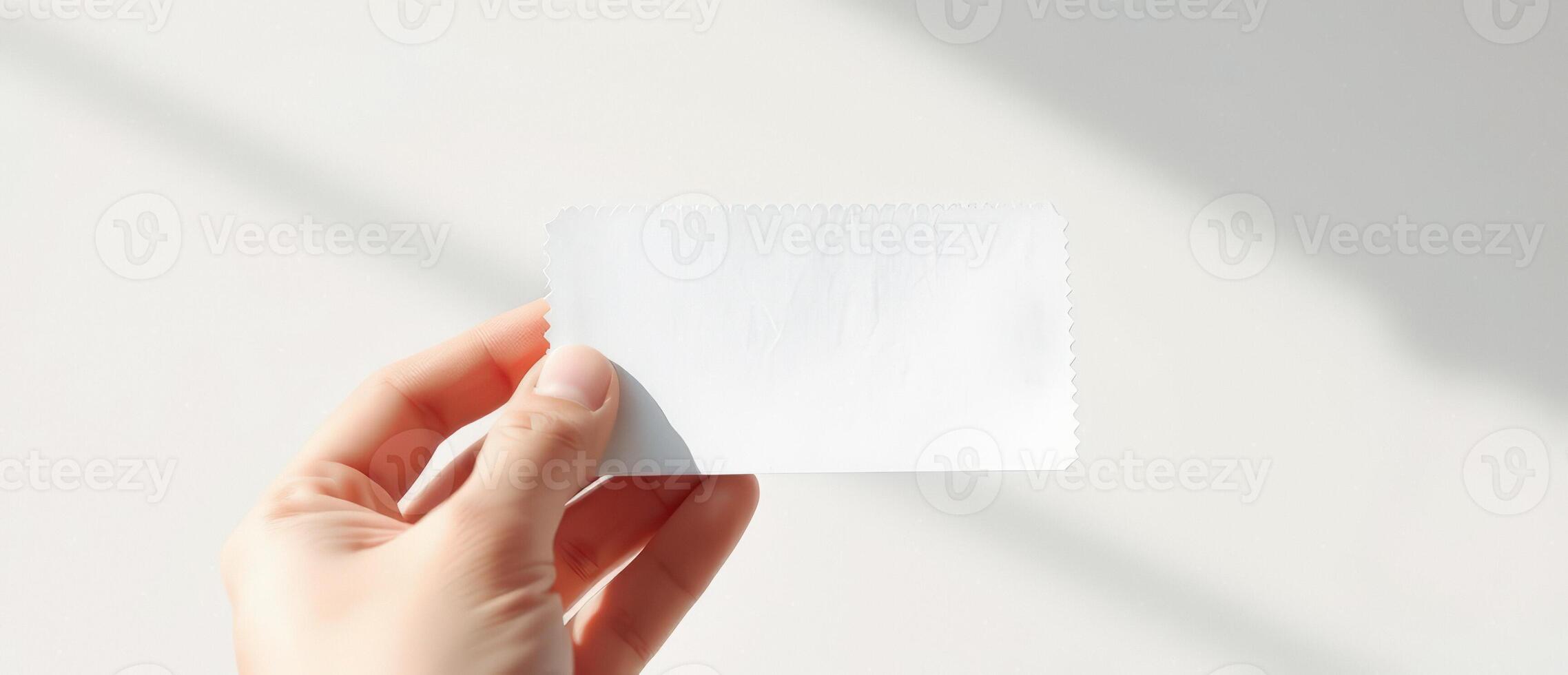 Hand Holding Blank Card With Shadow photo