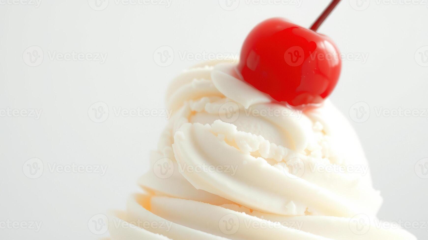 Closeup of a Cherry on Top of Vanilla Ice Cream photo