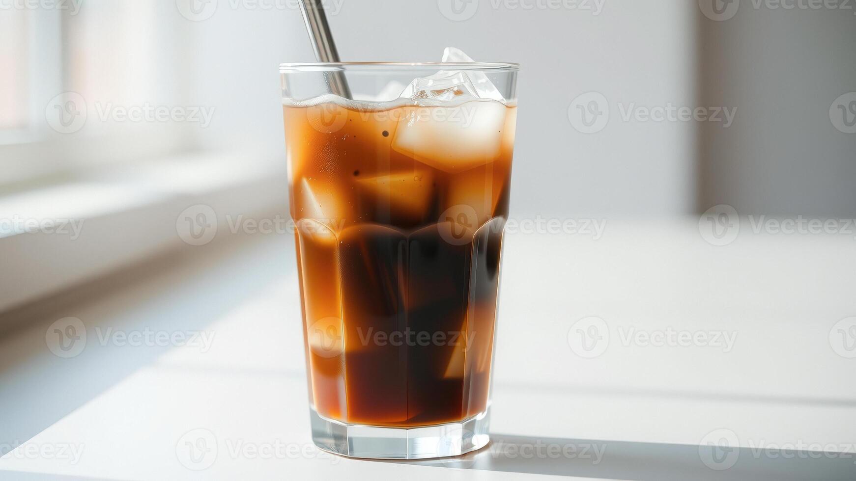 Iced Coffee in a Glass with Ice Cubes photo