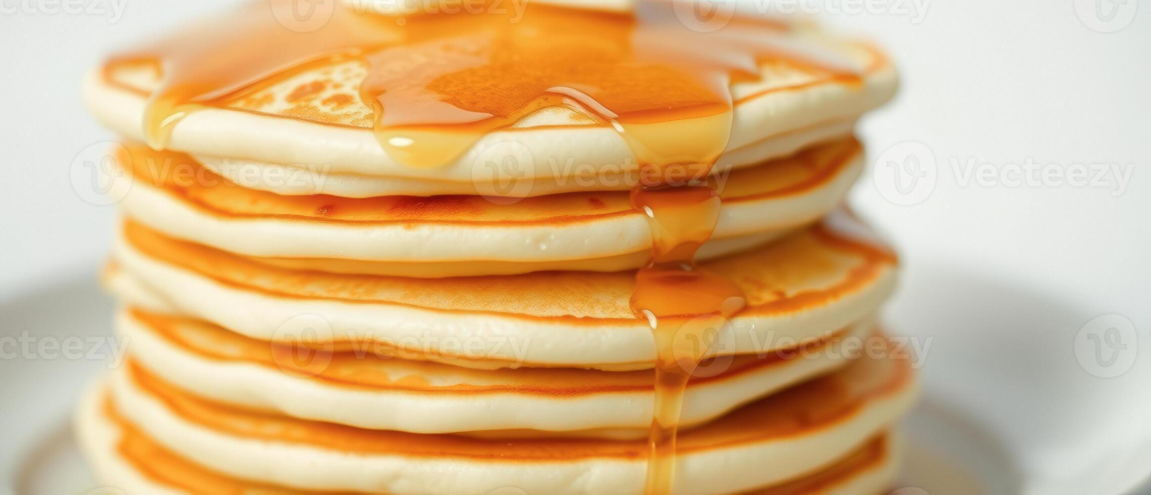 Stack of Pancakes Drizzled with Syrup photo