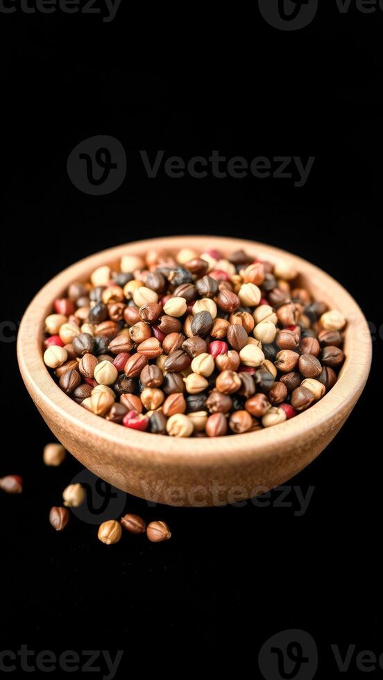 Close-up of a Wooden Bowl Filled with Mixed Nuts photo