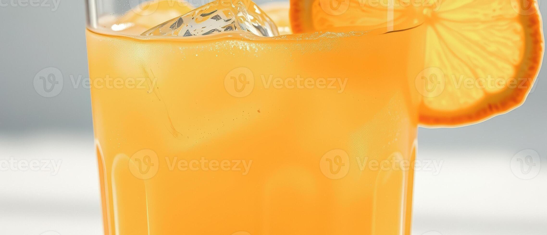 Close up of Orange Juice with Ice and Orange Slice photo