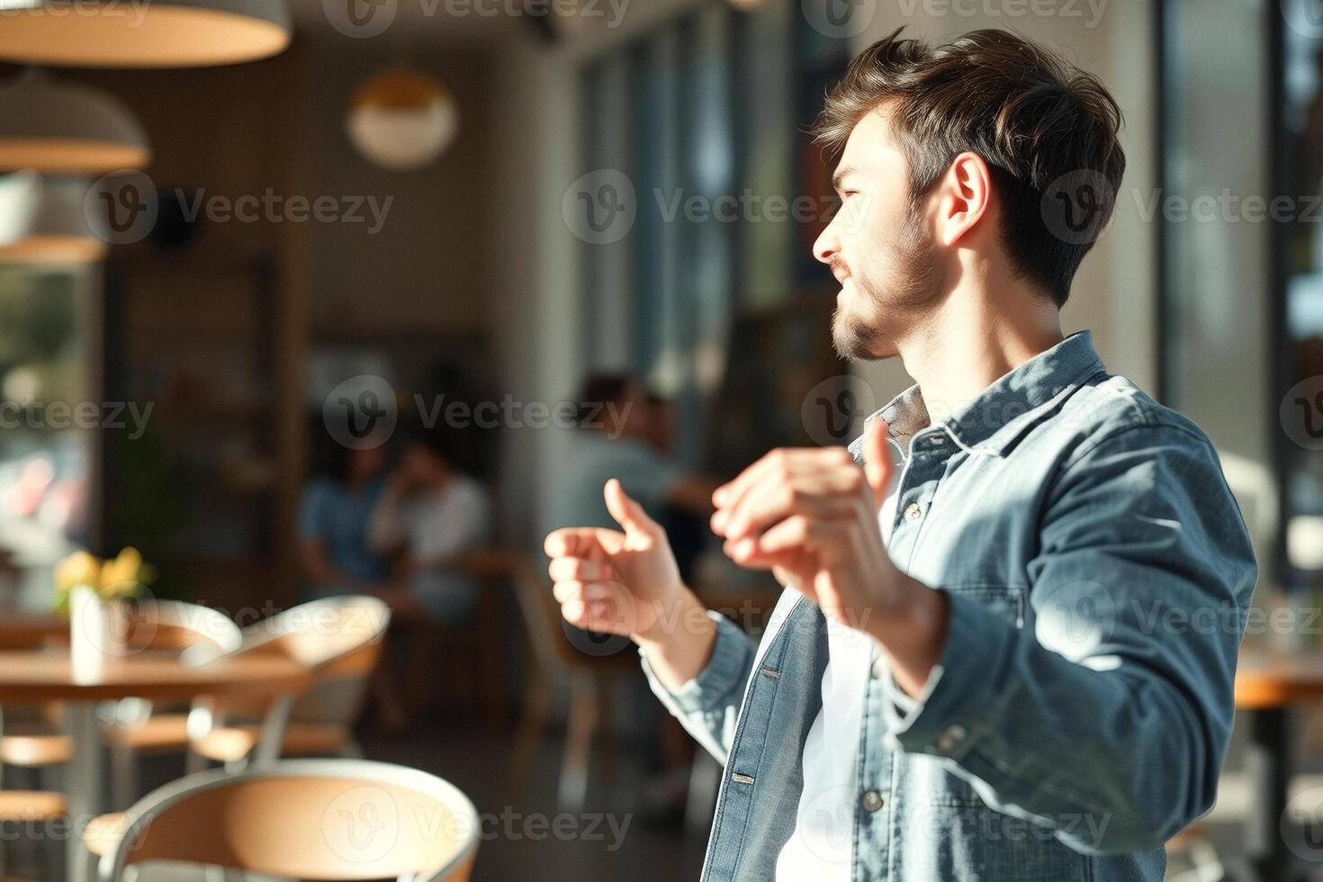 Man looking out a window in a cafe photo