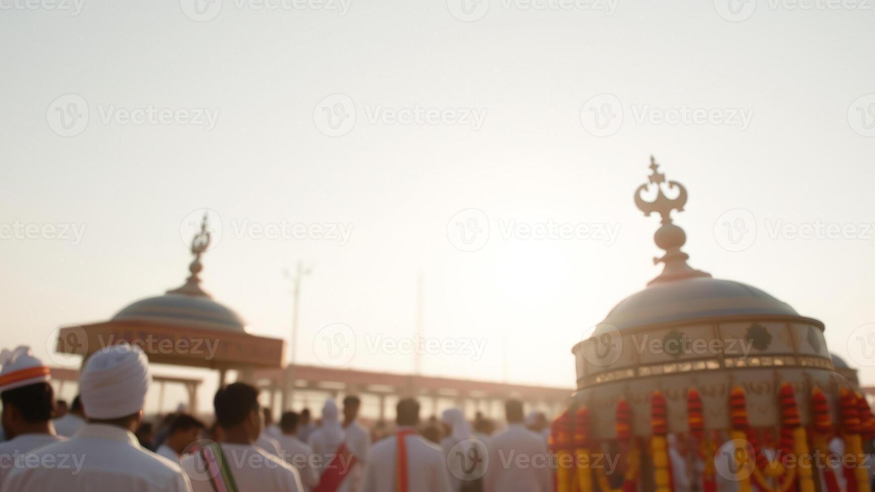 Blurred image of a religious procession with a bright sun behind photo