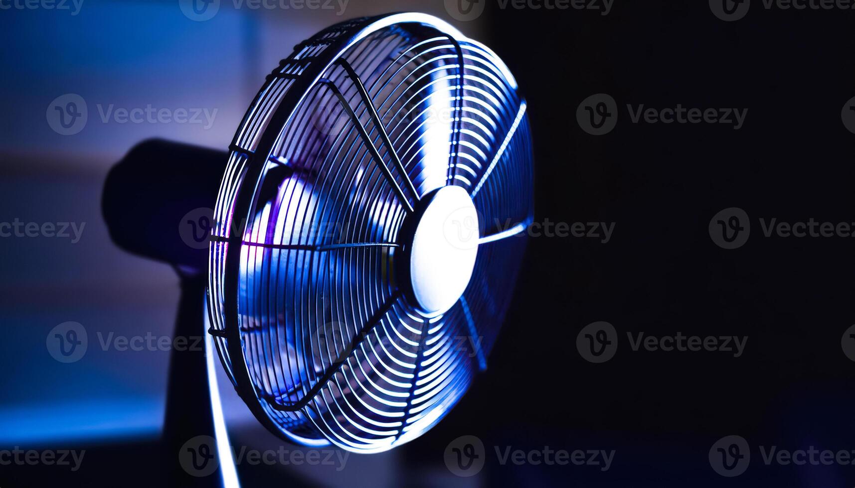 Close-up of a fan with blue light photo