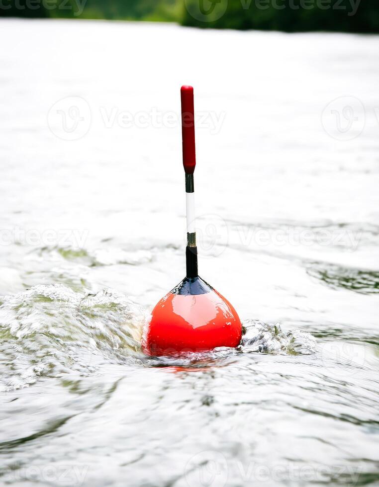 Red Buoy Floating on River photo
