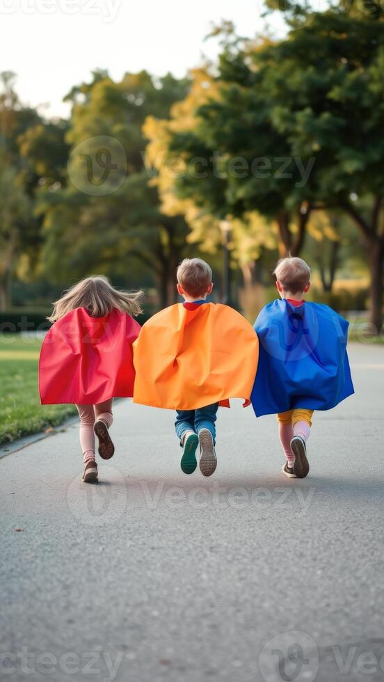 Kids Running in Superhero Capes photo
