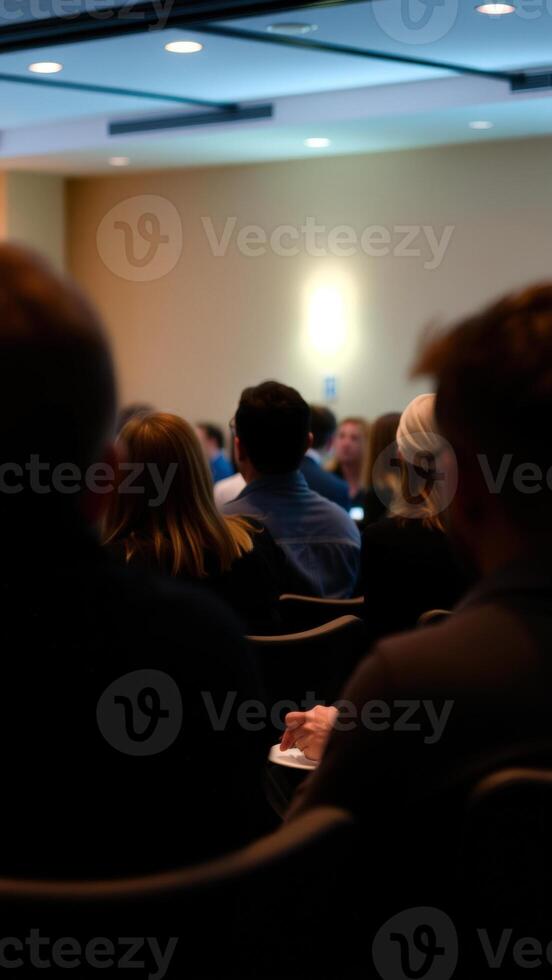 Audience Members in a Dark Room photo