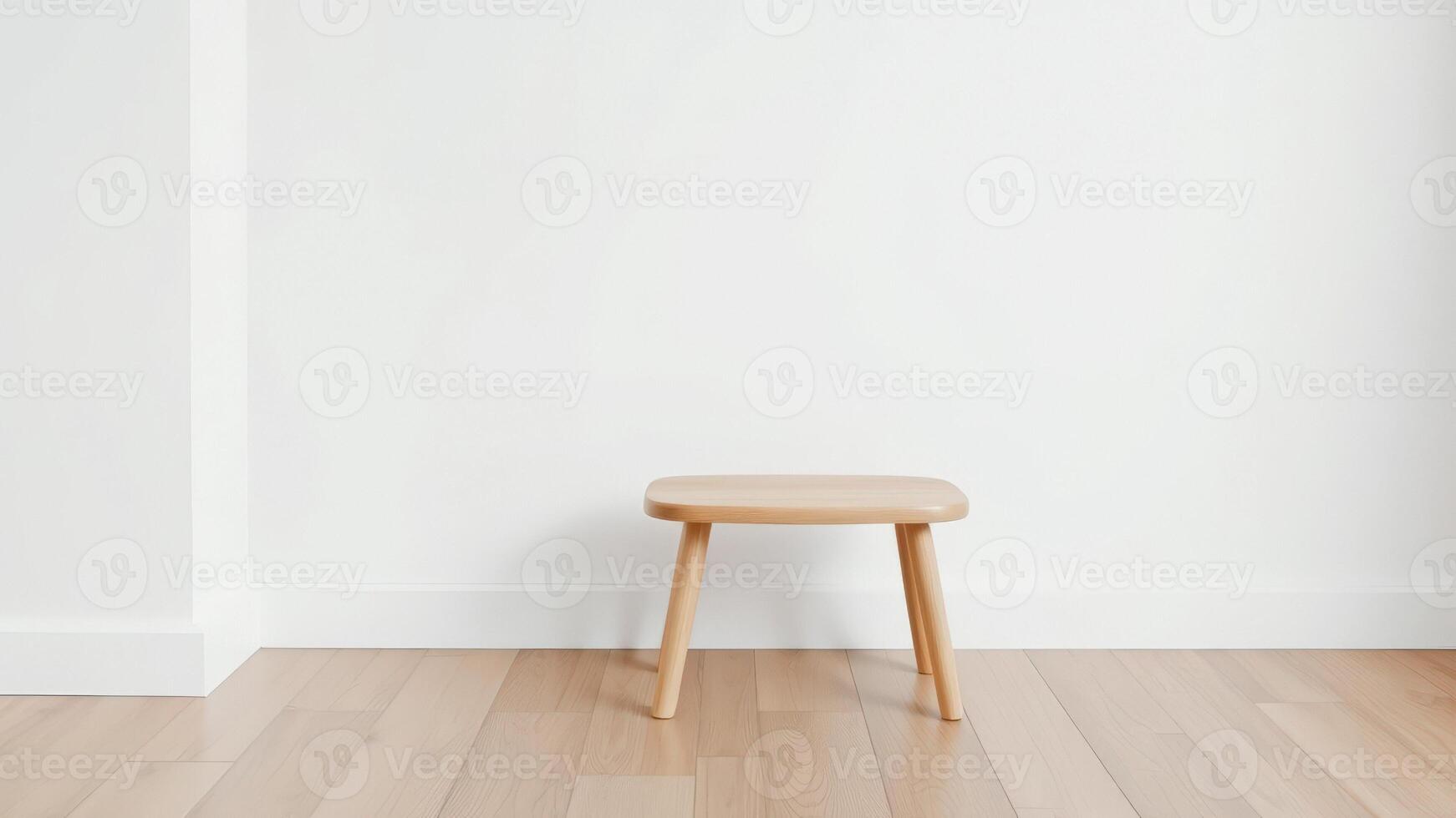 Minimalist Wooden Stool in Front of White Wall photo
