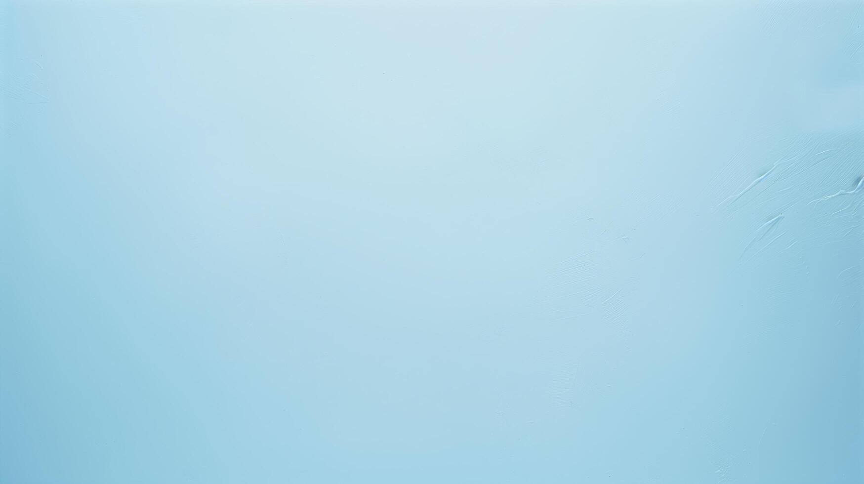 Gradient blue backdrop with water droplets forming streaks on the right side photo