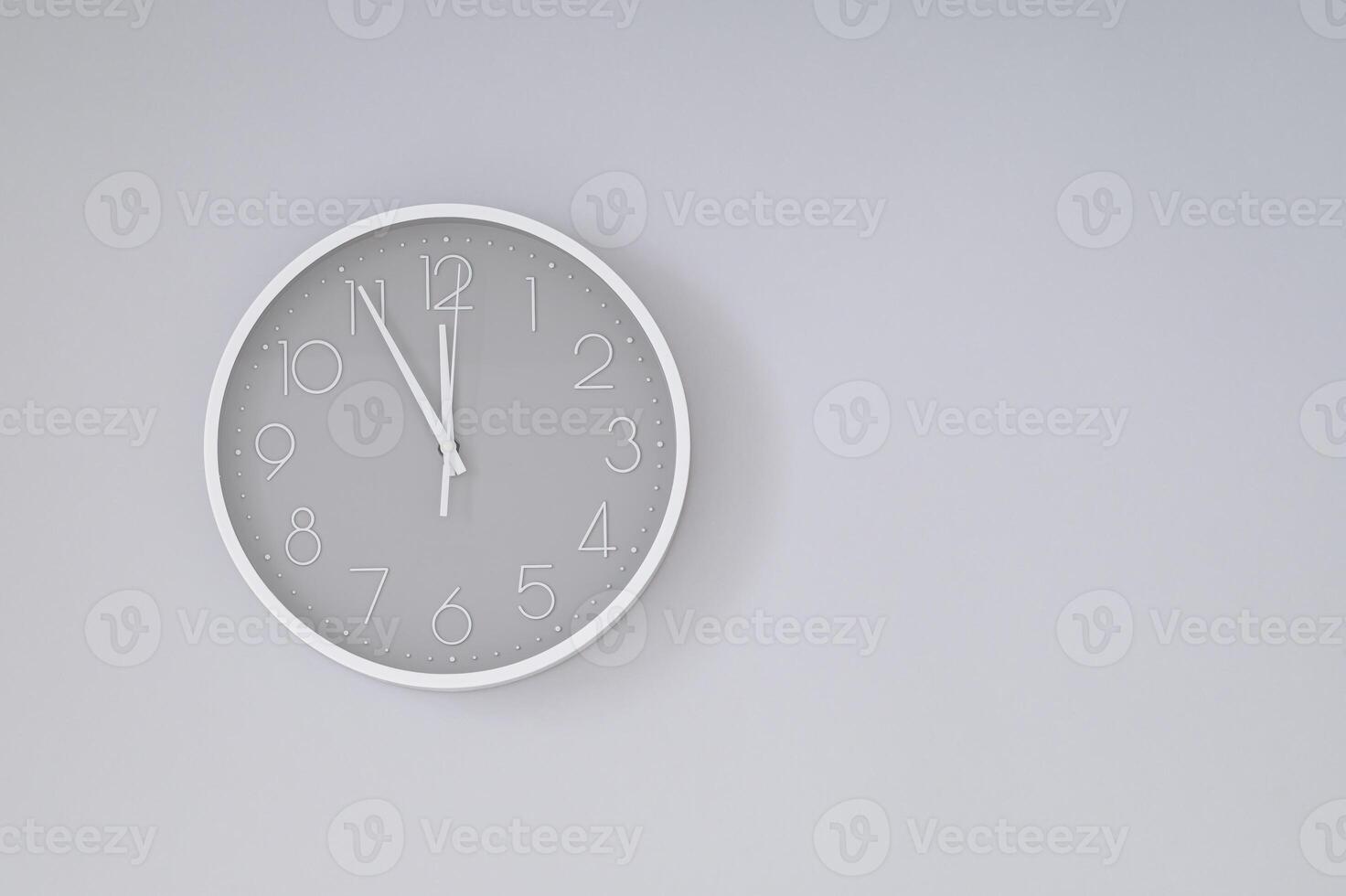 Gray and white wall clock on gray background. Time concept. Minimal Christmas eve or New Year idea. Flat lay composition. photo