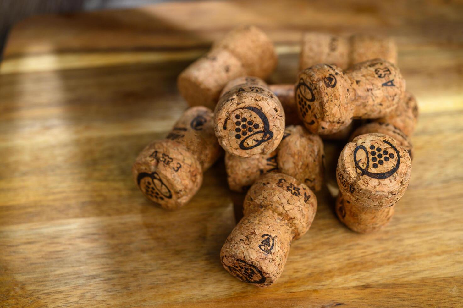 champagne corks on a wooden table photo