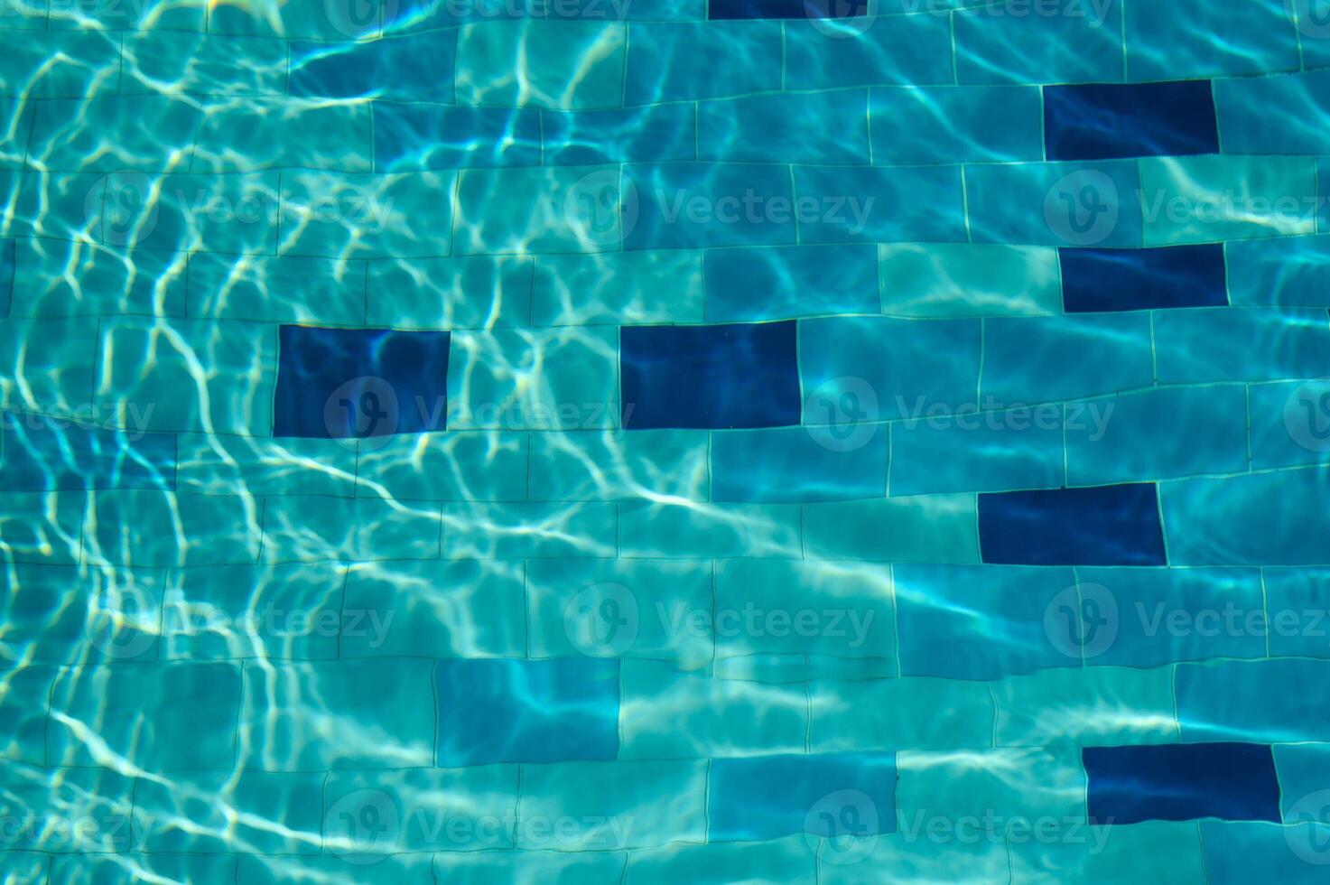 Overhead view of blue water surface abstract in a pool photo