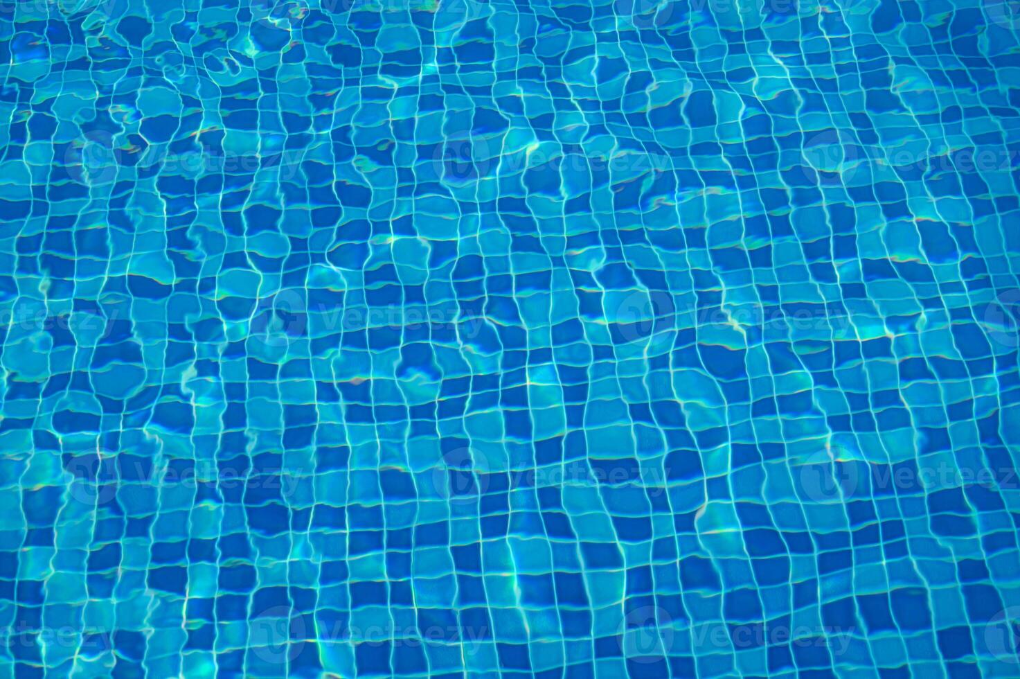 Texture of water in swimming pool for background photo