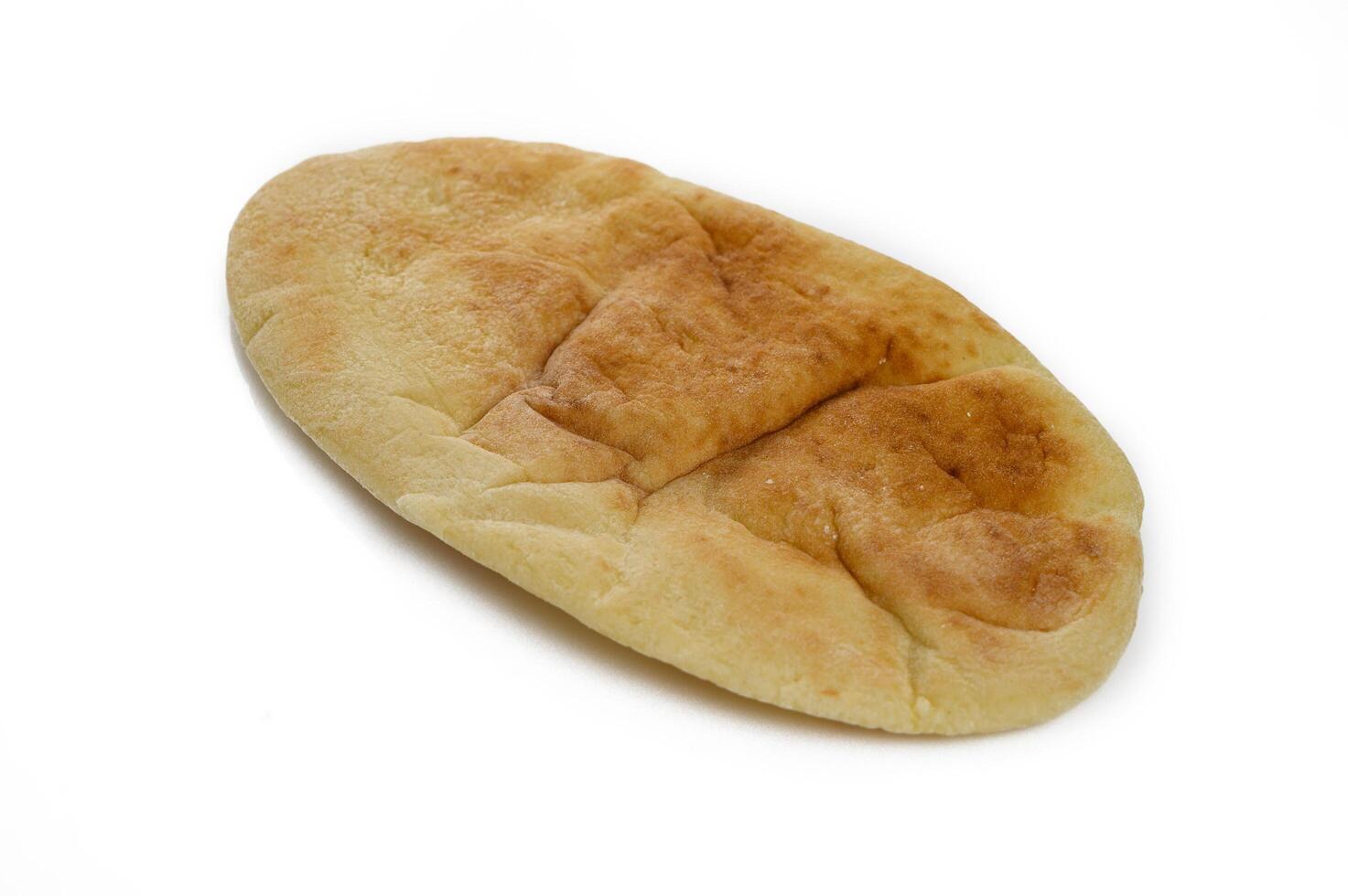 pita bread isolated on white background. traditional bread photo