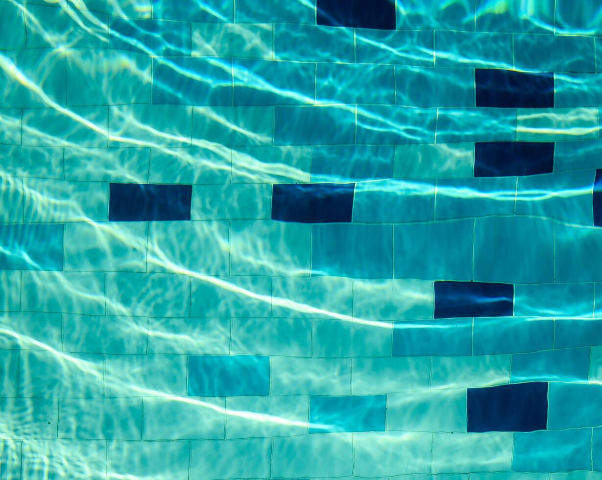Blue ripped water in swimming pool photo