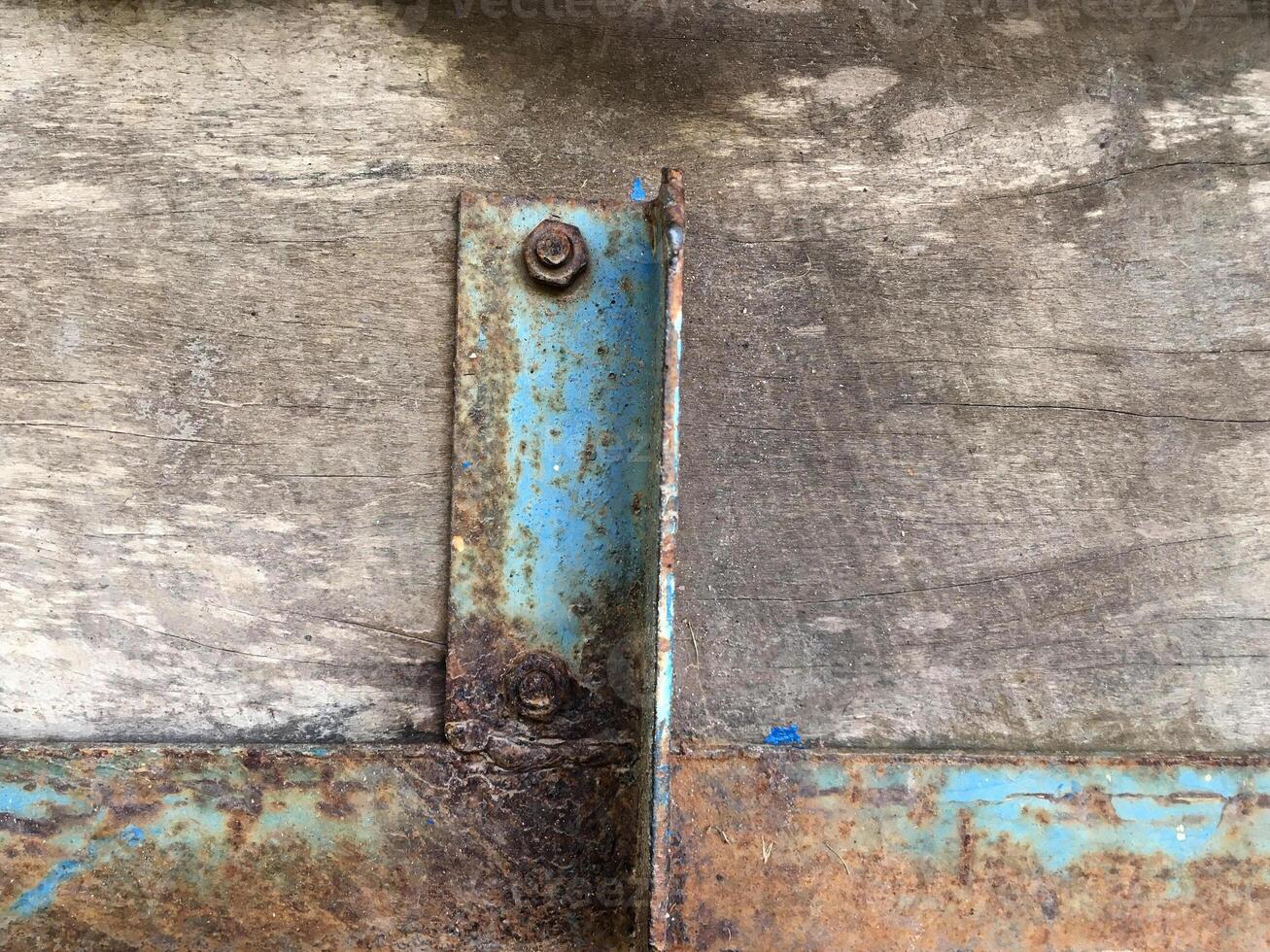 old rusty door with a metal handle photo