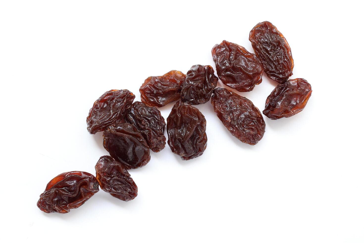 Dried fruit isolate on white background, dried grapes on white background photo