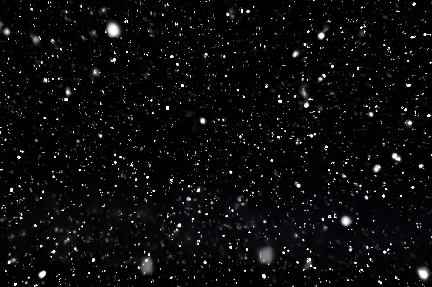 Detailed Snowfall Overlay Image Isolated on Black Background Perfect for Dynamic Visual Effects photo